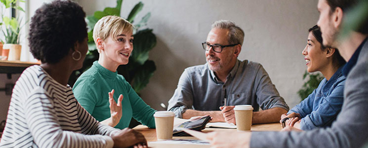 A group of co-workers having a meeting